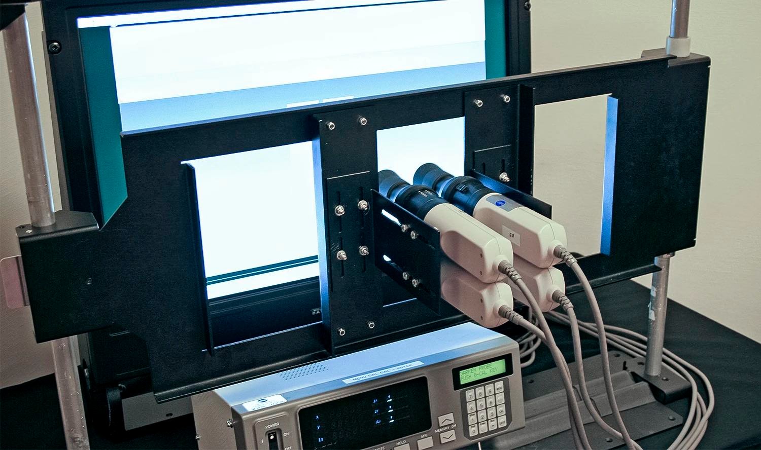 The image shows part of the color calibration setup at Hatteland Technology's production facilities. 