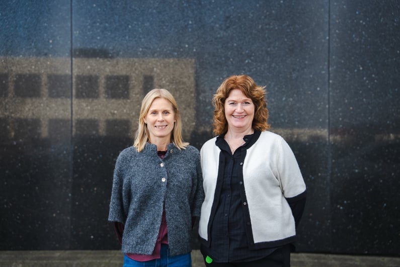 Two of Hatteland Technology's staff in front of the new building. From the left,&nbsp;Anna Aulie, VP People & Communication,  and Helen Søvold, Office Manager/HR Coordinator.&nbsp;