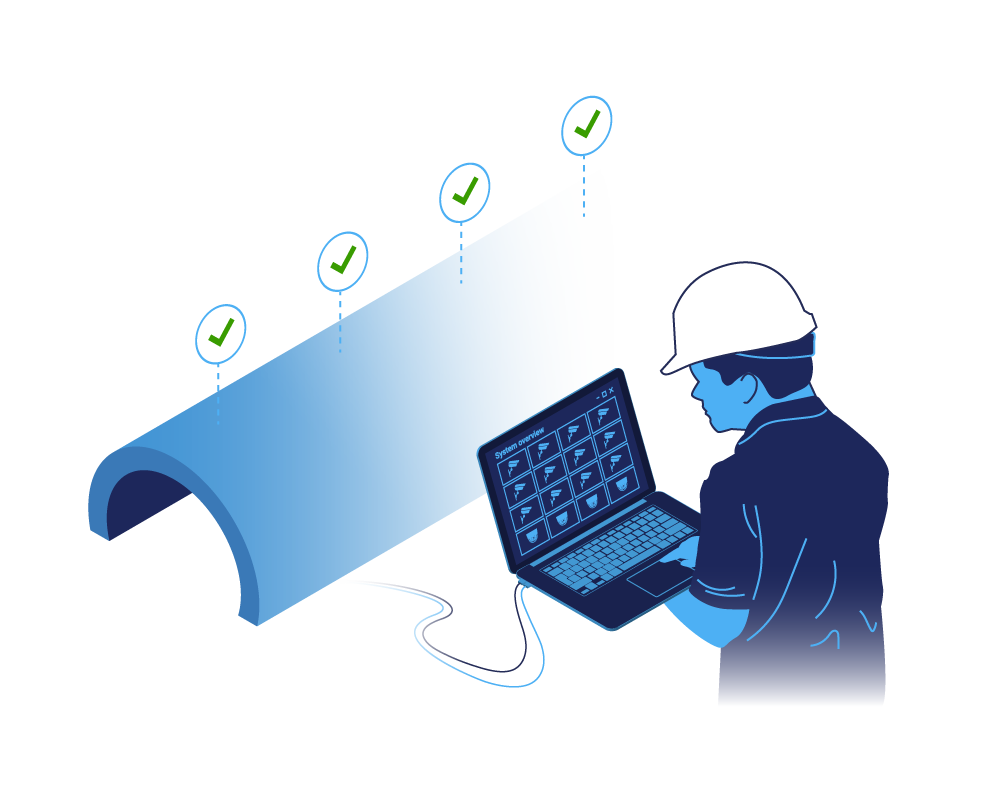 commissioningAn engineer, wearing a hardhat, holding a laptop, is configuring a technical system inside a tunnel. It illustrates how Hatteland Technology helps with commissioning of the systems they deliver. 